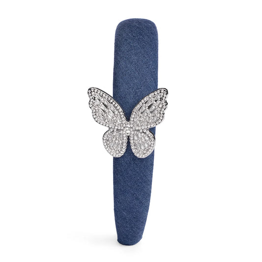 Close-up detail of the butterfly motif on the Dolly Parton denim headband