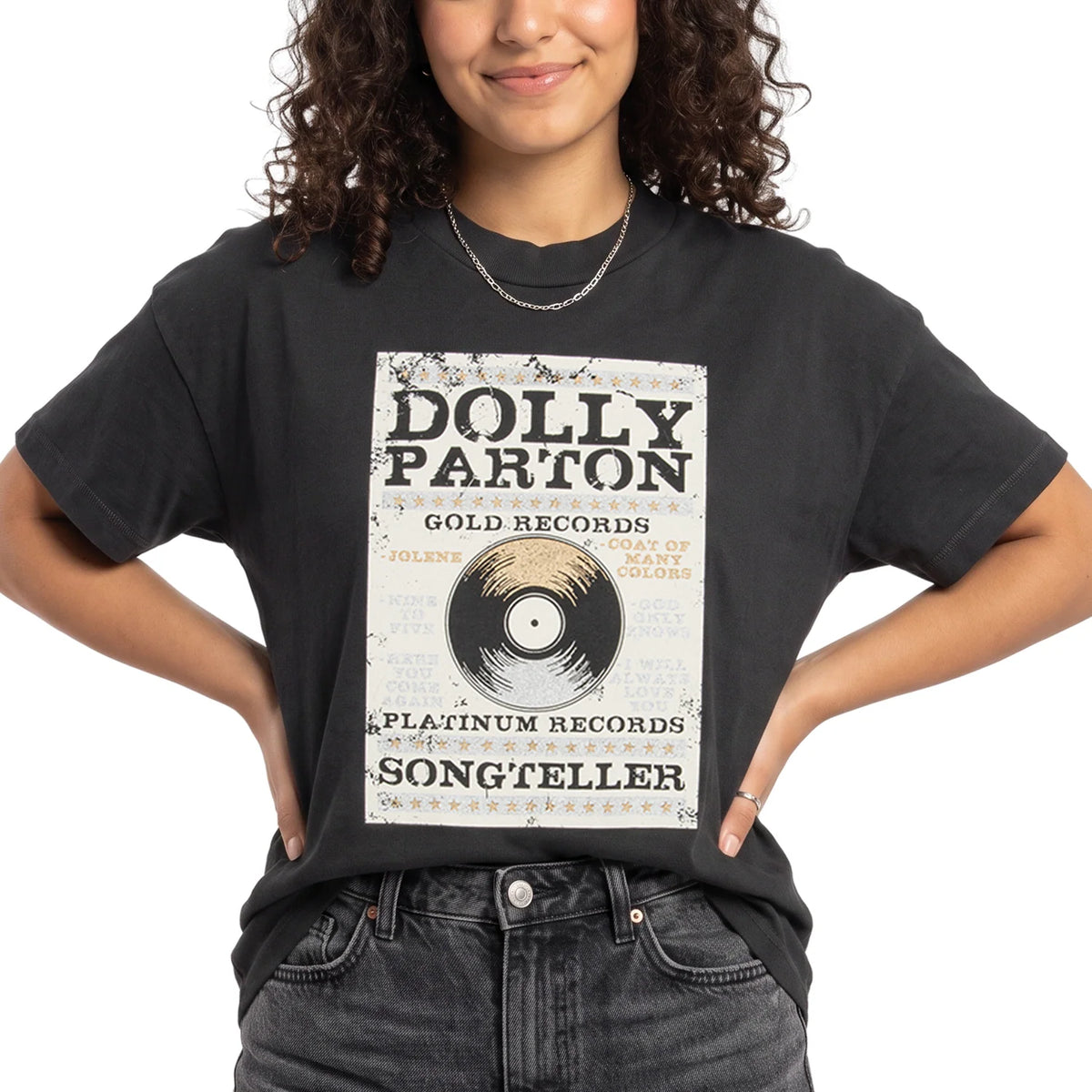 Close-up of the front chest graphic showing Dolly Parton and Platinum & Gold lettering on the black t-shirt