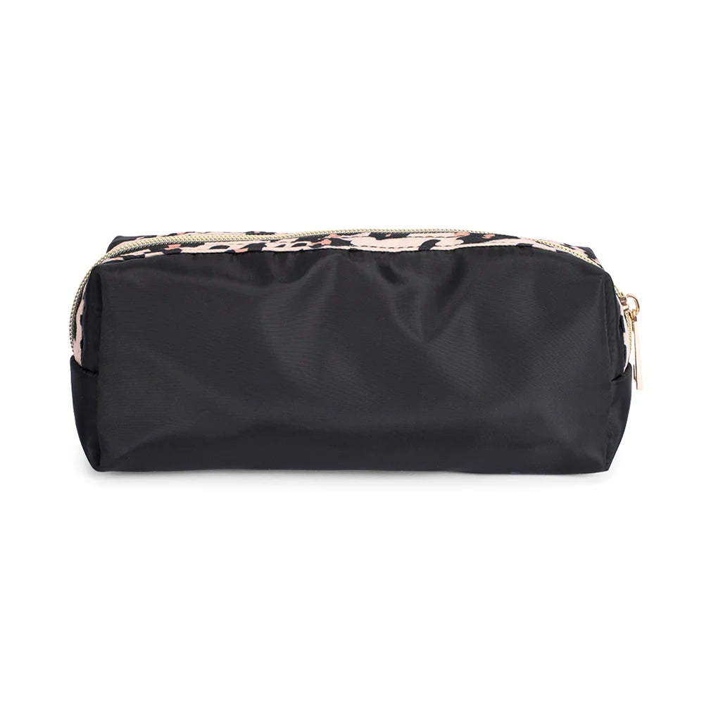 Close-up detail of the zipper closure and textured material on the Dolly Parton makeup bag