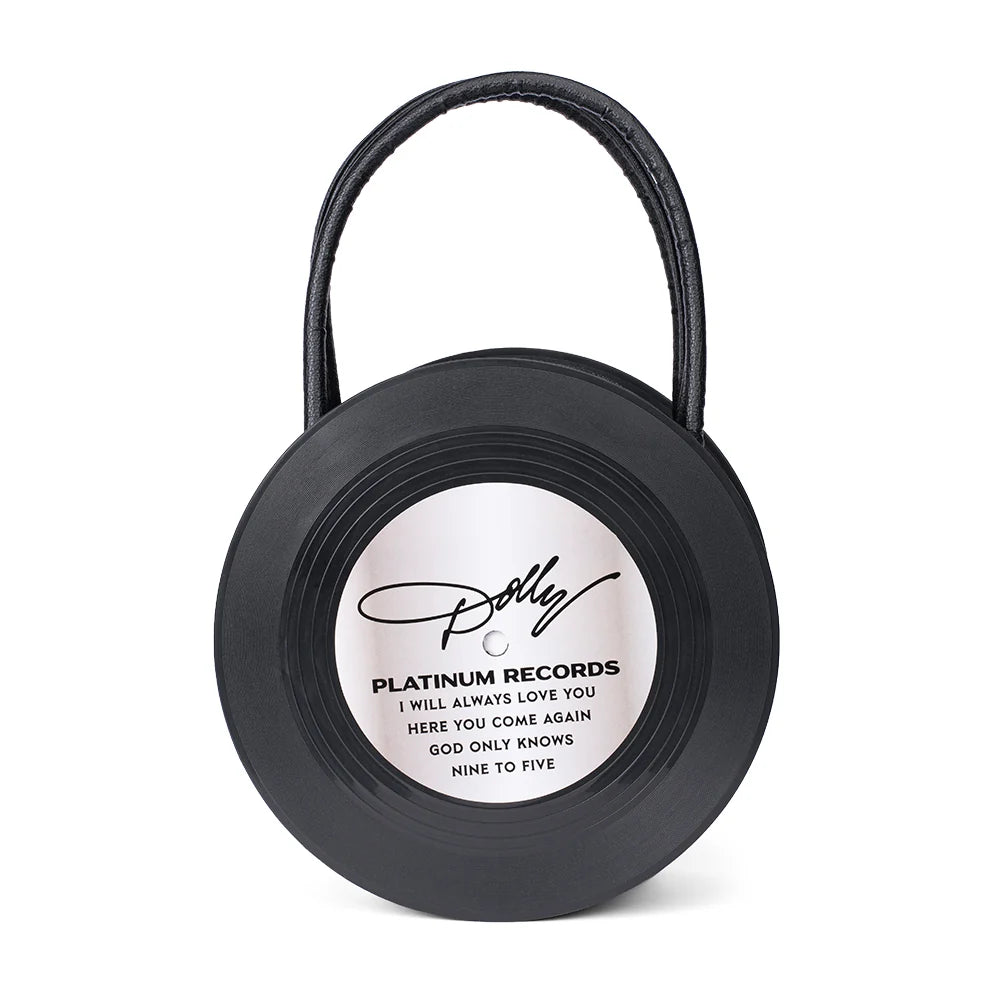 Side angle view of the Dolly Parton bag showing the black fabric silhouette and strap construction
