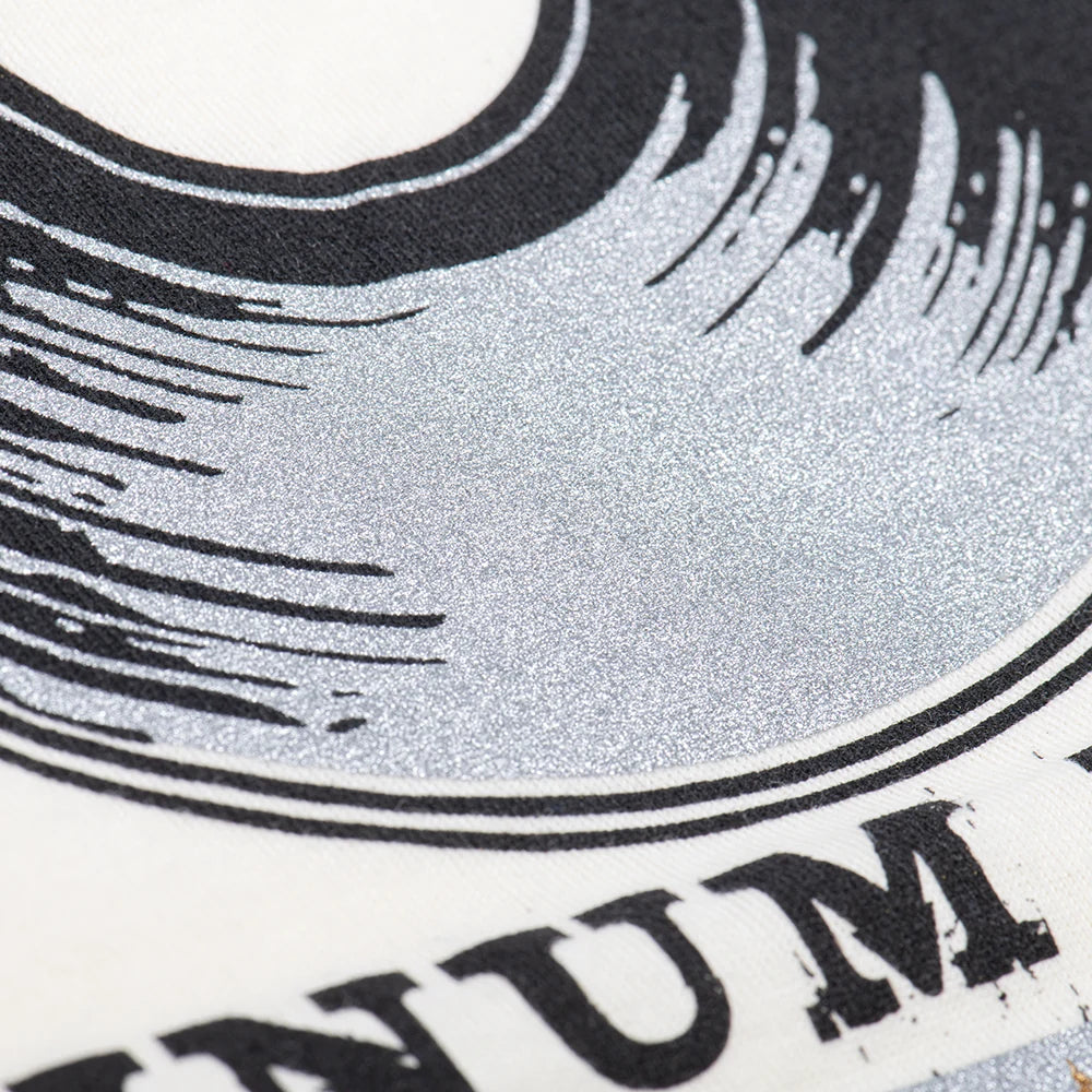 Detailed view of the interior collar tag featuring official Dolly Parton branding