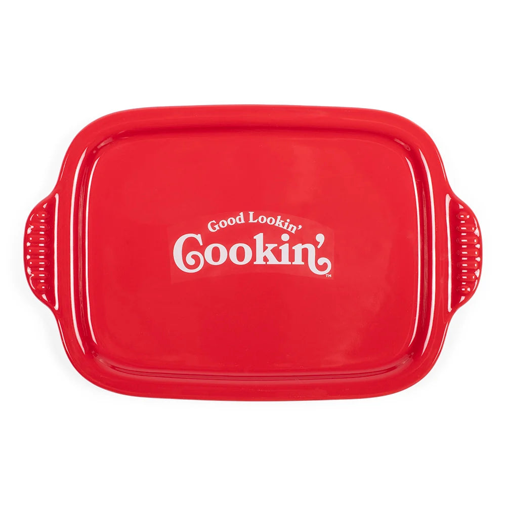 Angled side view of the casserole dish highlighting the durable handles and exterior artwork