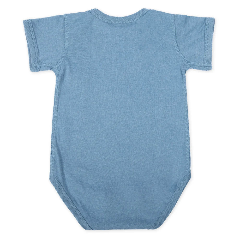 Back view of the vintage indigo baby bodysuit showing the solid color and shoulder fold details