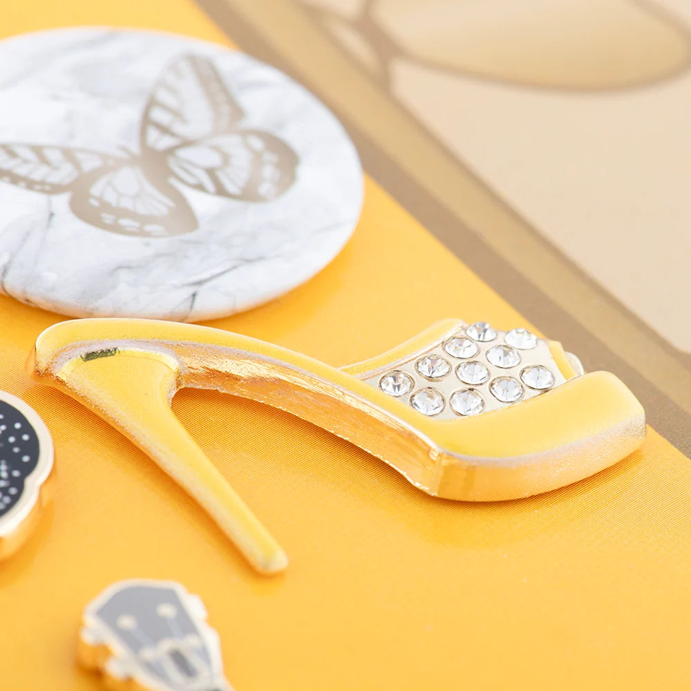 Packaging detail of the official Dolly Parton guitar pin set