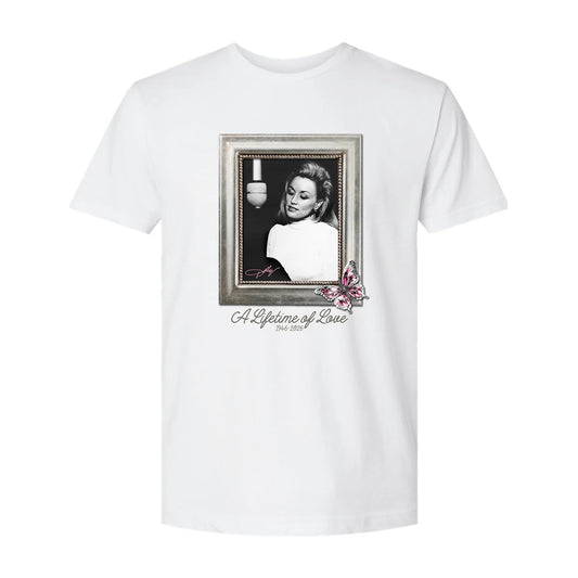 Front view of the white Dolly Parton Legacy Retro t-shirt featuring vintage-style graphic artwork across the chest