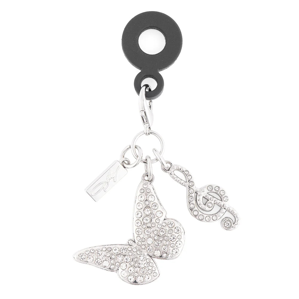 Angle view of the Dolly Parton silver butterfly charm presented against a clean backdrop