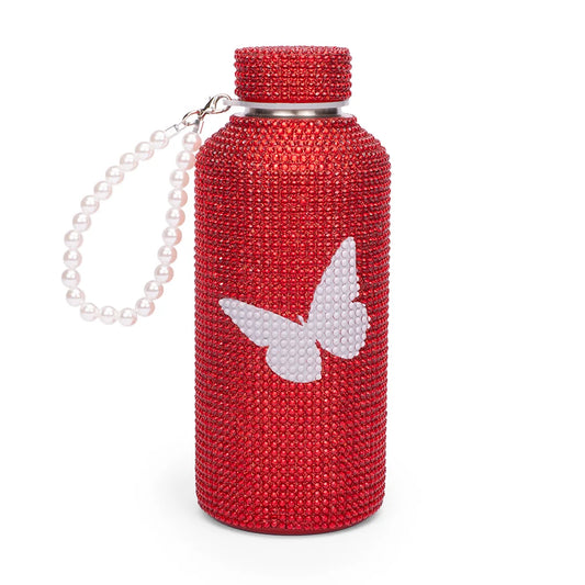 Red Dolly Parton water bottle featuring a sparkling rhinestone screw top and pearl wristlet strap