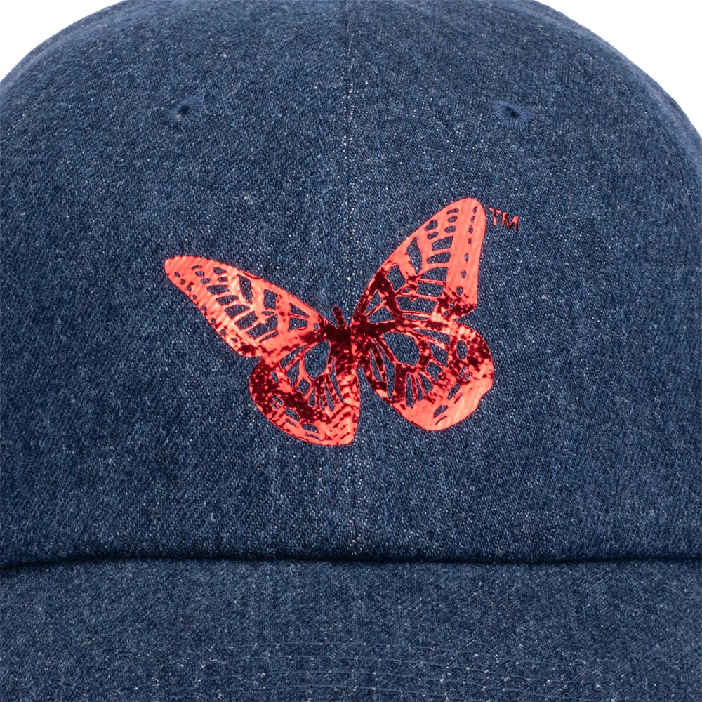 Close-up detail shot of the foil butterfly design on the front panel, showing the metallic sheen and texture.