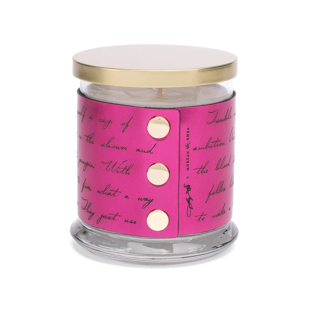 Hot pink jar candle featuring the Dolly Parton Garden District design on the front label