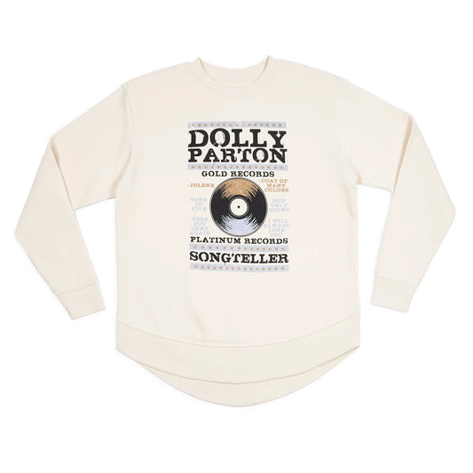Cream-colored hi-lo pullover sweatshirt featuring the Dolly Parton Platinum and Gold design on the front chest