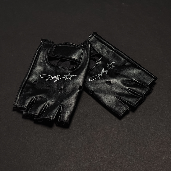 Load image into Gallery viewer, Official Dolly Parton Merchandise. PU leather fingerless gloves featuring the Dolly Parton Rockstar logo. Finish off your rocker look with this iconic gloves.
