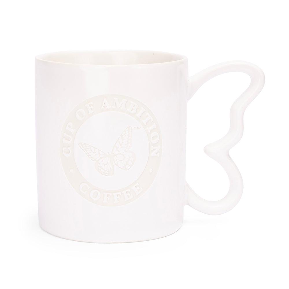 White ceramic mug with laser etching and a sculpted butterfly handle, front view