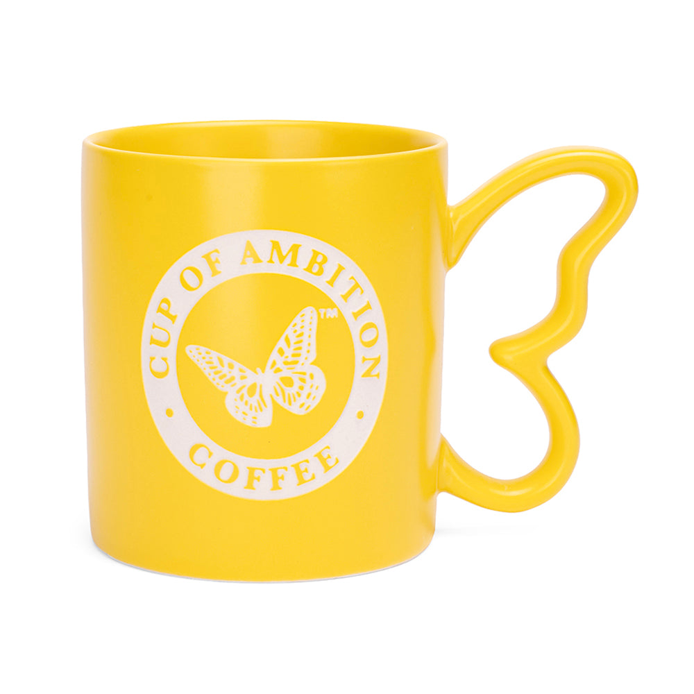 Yellow ceramic coffee mug featuring a sculptural butterfly handle and laser-etched details, front view