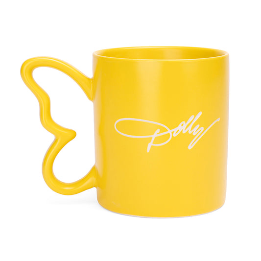 Side view of the yellow Dolly Parton mug highlighting the contoured butterfly handle shape