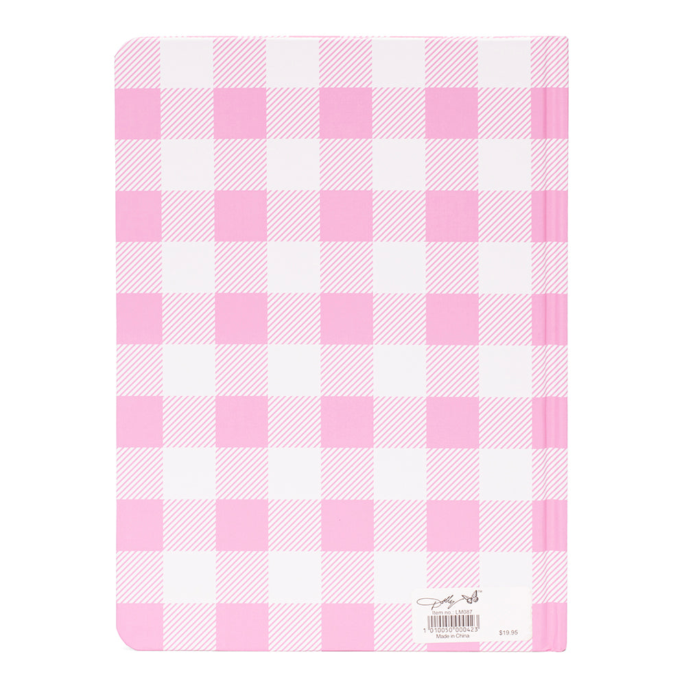 Open pages of the Dolly Parton journal displaying lined writing paper
