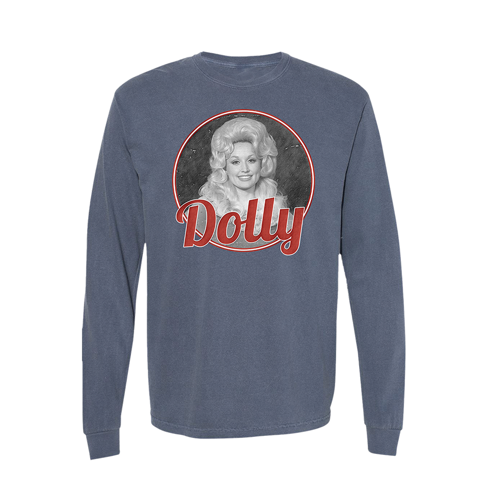 Official Dolly Parton Merchandise. 100% cotton, denim blue unisex long sleeve t-shirt with a relaxed fit featuring a black and white photo of Dolly Parton and a red script logo.