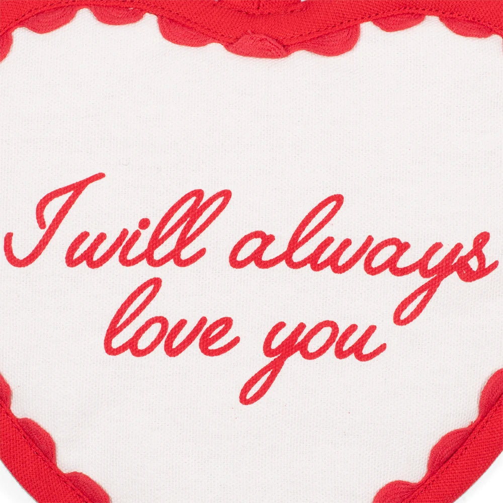 Back view of the red heart-shaped Dolly Parton pot holder showing the solid fabric and hanging loop