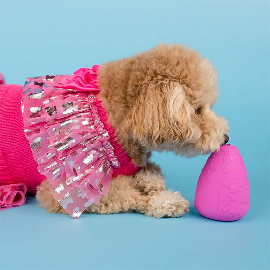 Official Dolly Parton Merchandise. Pink natural rubber treater toy featuring Dolly Parton's iconic butterfly logo.