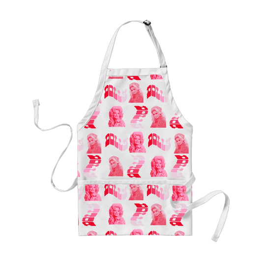 Official Dolly Parton Merchandise. White all over print kitchen apron with a pink photo illustration of young Dolly Parton and a wavy pink gradient Dolly logo repeated across the apron.  Featuring a metal adjustable neck strap, tie up waist band and front pockets.