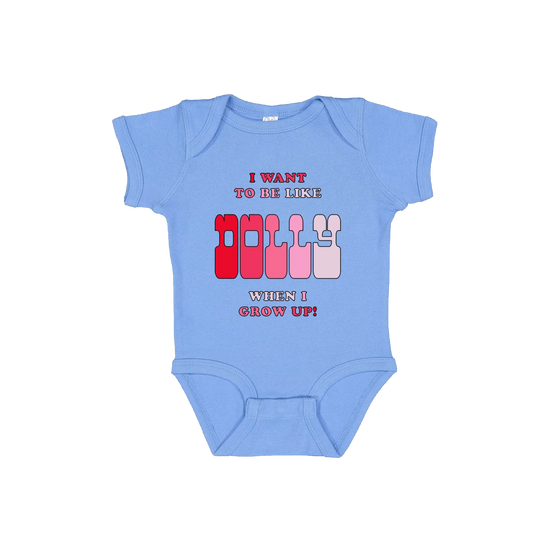 Official Dolly Parton Merchandise. 100% cotton blue baby onesie with the words "I want to be like Dolly when I grow up!" print on the front in gradient pinks.  Features a three snap enclosure.