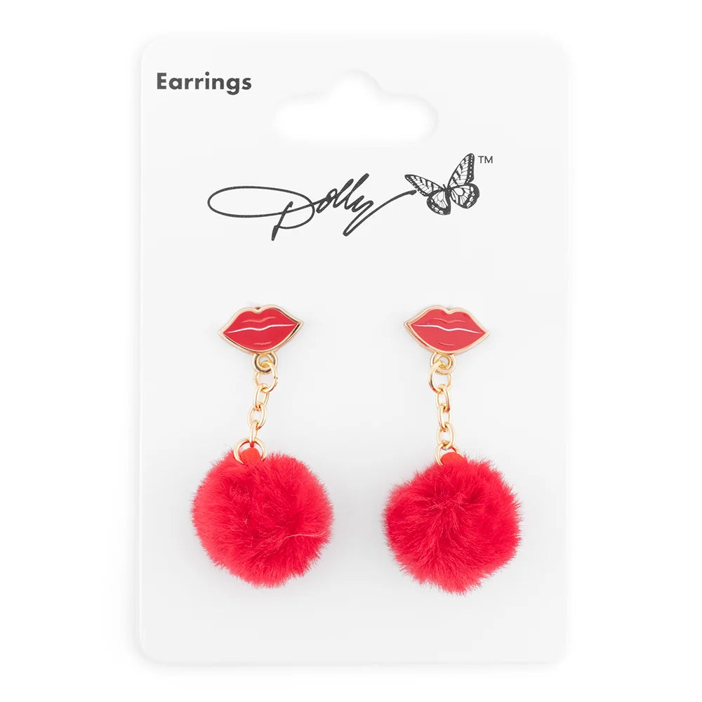 Side angle of the Dolly Parton denim country earrings showing their length and drop silhouette