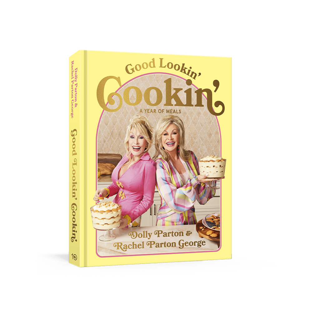 Close-up of ’Good Lookin’ Cookin’ cookbook with two women holding cakes