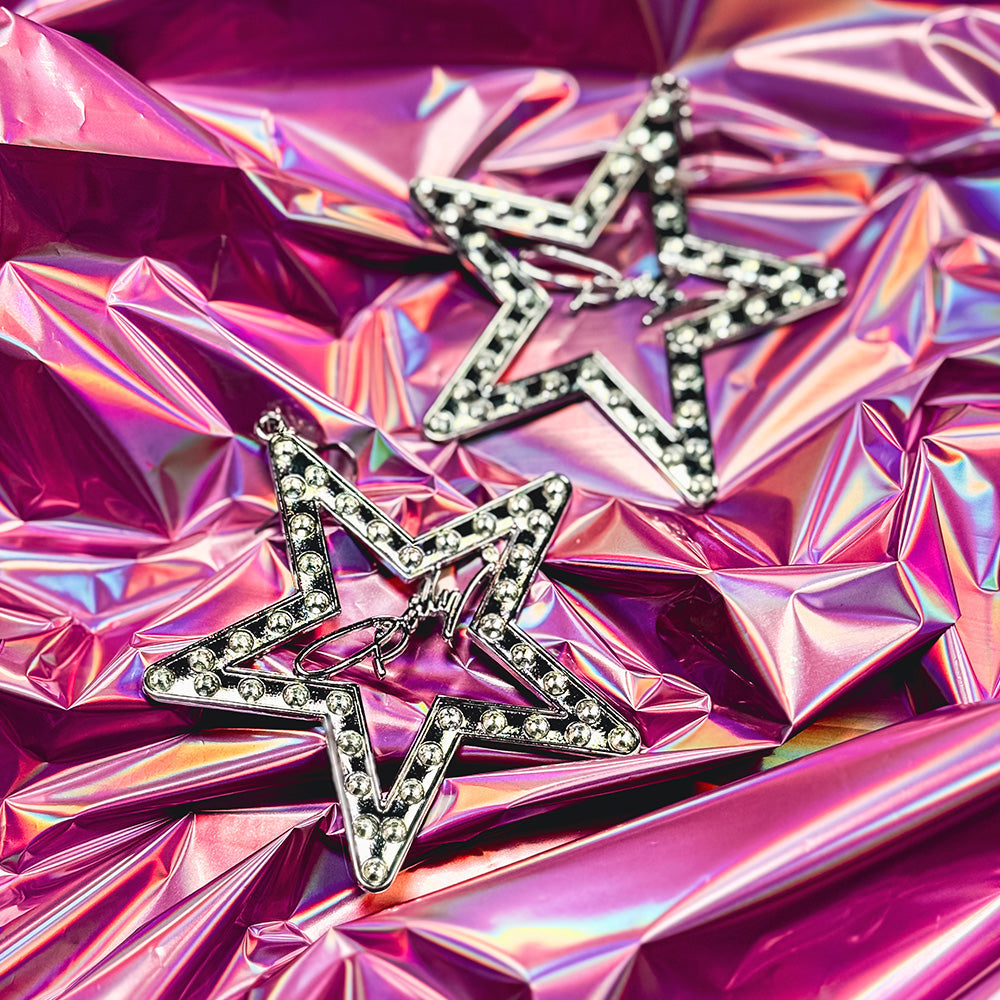 Rhinestone Earrings: A pile of shiny pink stars for a dazzling Dolly Parton-inspired look