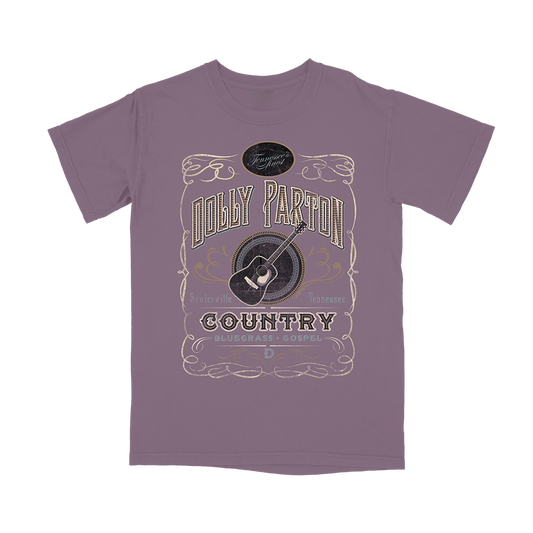 Official Dolly Parton Merchandise. Premium 100% cotton, unisex burgundy t-shirt with a relaxed fit featuring a whisky bottle label inspired design.