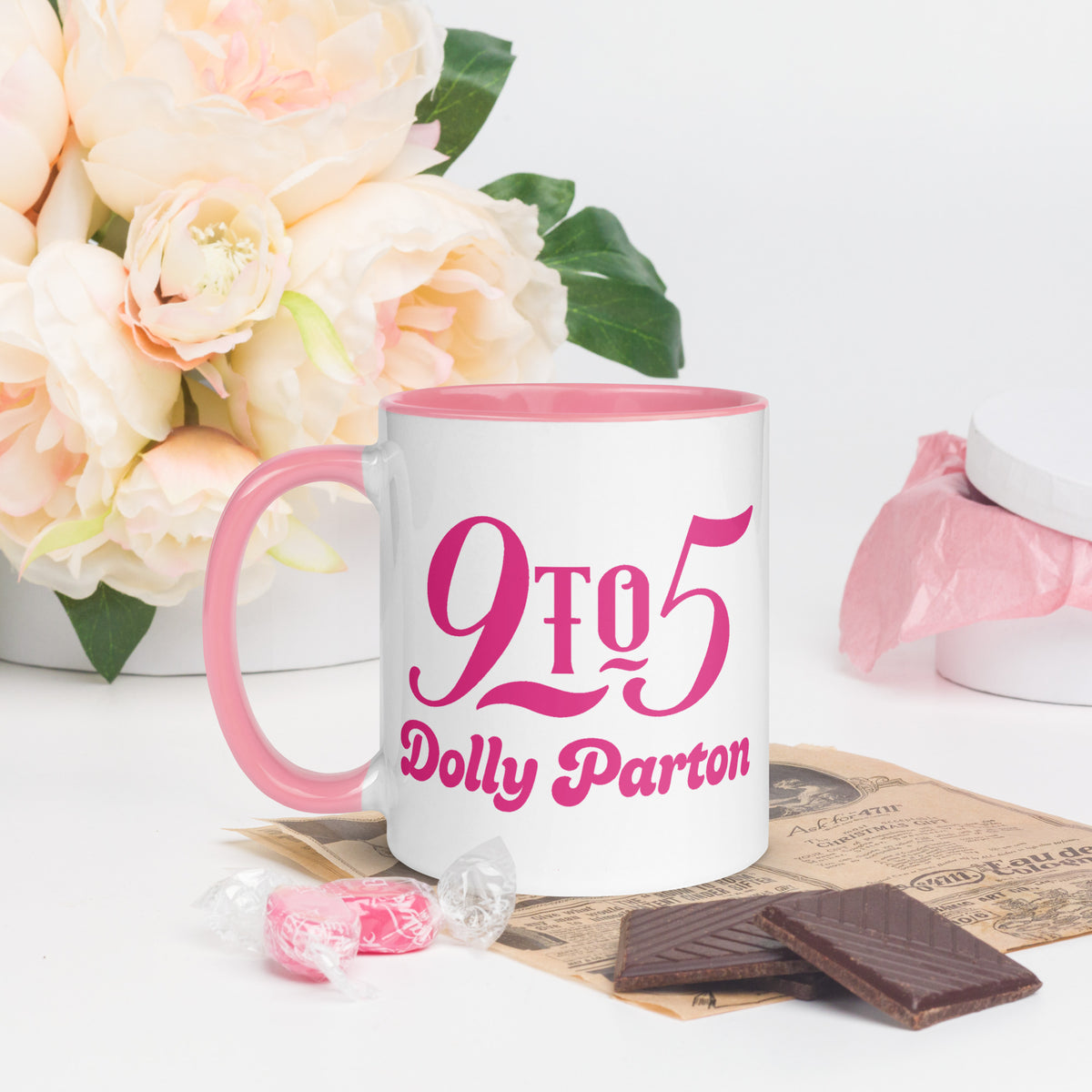 Close-up of the 9 to 5 graphic on the black ceramic mug